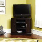 Dark finished wood corner TV stand with under shelving unit and a pair of cabinets