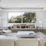 Modern minimalist living room in pristine white