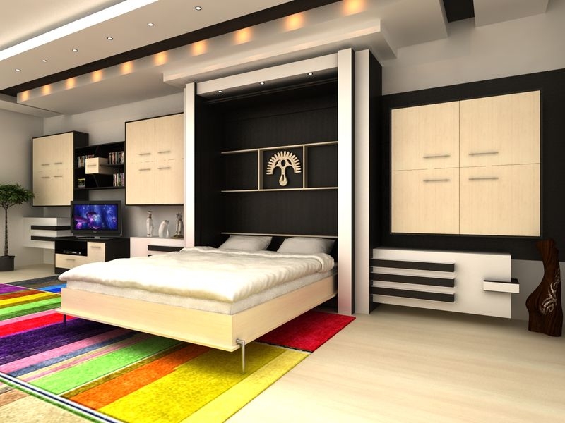 Кровать - шкаф как часть модульного гарнитура в гостиной