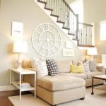 captivating decorate a large living room wall with white classic clock pattern as dim grey ornate design as well as interior design ideas for living rooms plus living room furniture decorating ideas 910x608