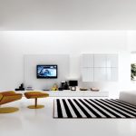 astonishing minimalist style interior design living room spacious with wooden floor designers gallery modern futuristic brown lounge chair comfortable sofa white paint wall decoratio 1