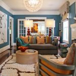 picturesque living room decorating ideas with blue mixed white schemes wall paint and equipped gray fabric couch sofa convertible plus cute colorful themed throw pillows opposite cream drum shape coff